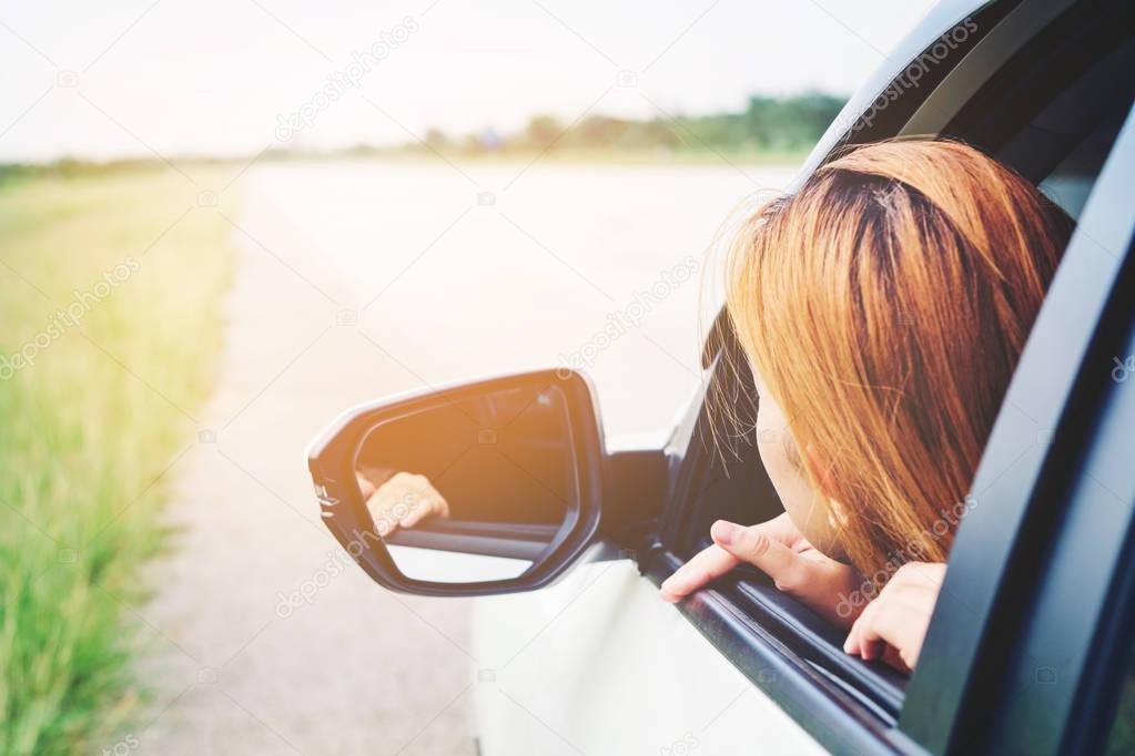 Intermediate family rental car on a scenic road